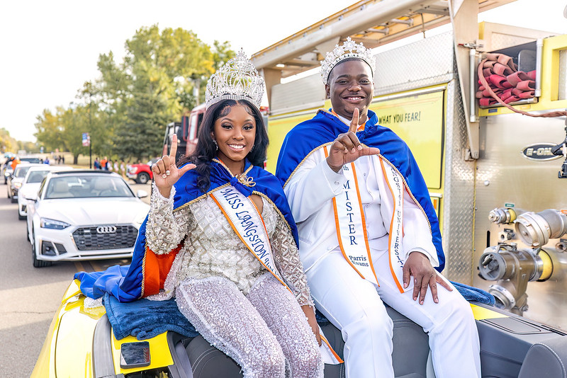 Photo of Miss and Mister Langston participating in the LU parade