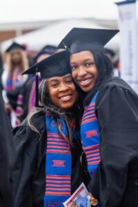 Cerita and Alexis Barnett pose together in their regalia.