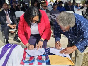 President Jackson and Mr. Stewart Wiliams sign the new MOU between Langston University and Wm Conrad Veterans Memorial Gardens.