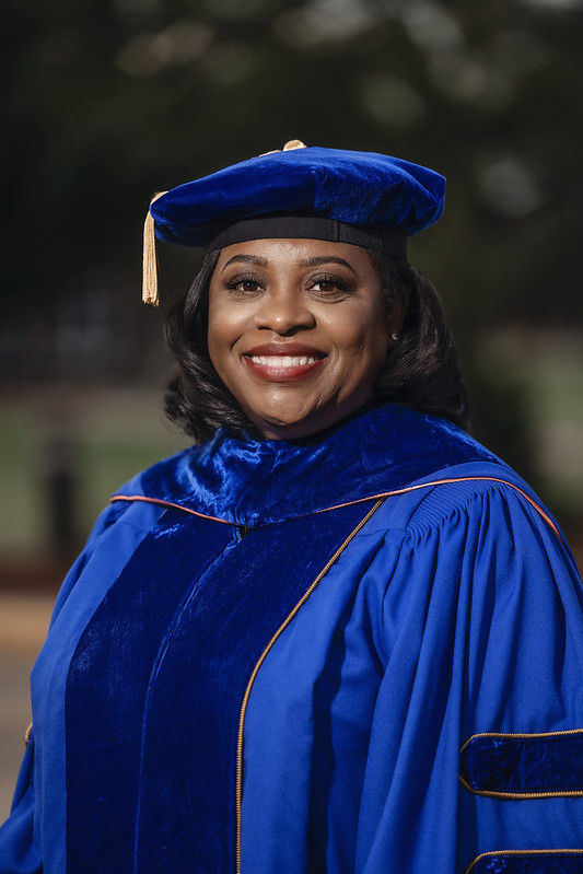 Photo of 17th President Ruth Ray Jackson in regalia angled, looking in from right