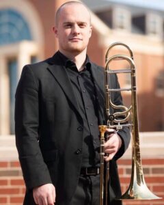 Jason Potts poses with trombone