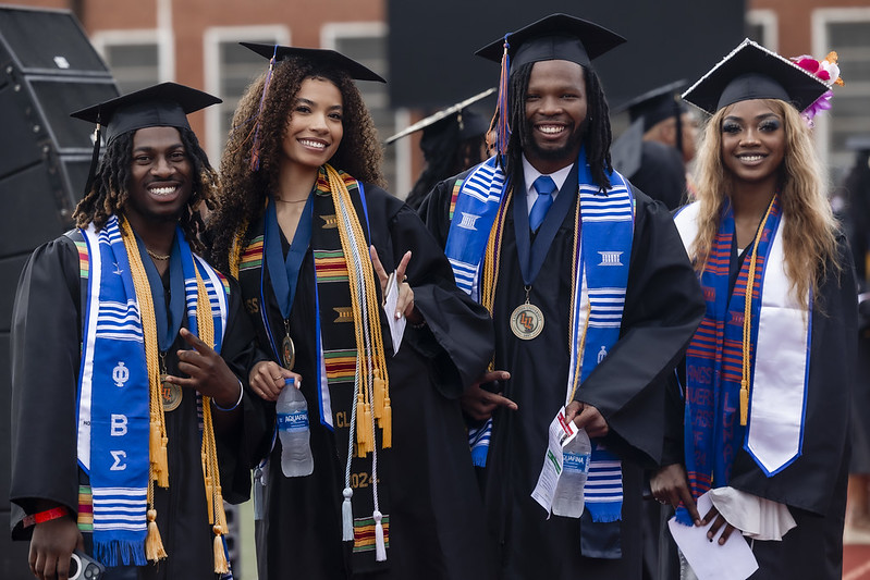 Photo of four Langston University graduates from May 2024.