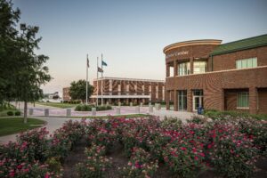 Flowers framing the Student Union at Langston University