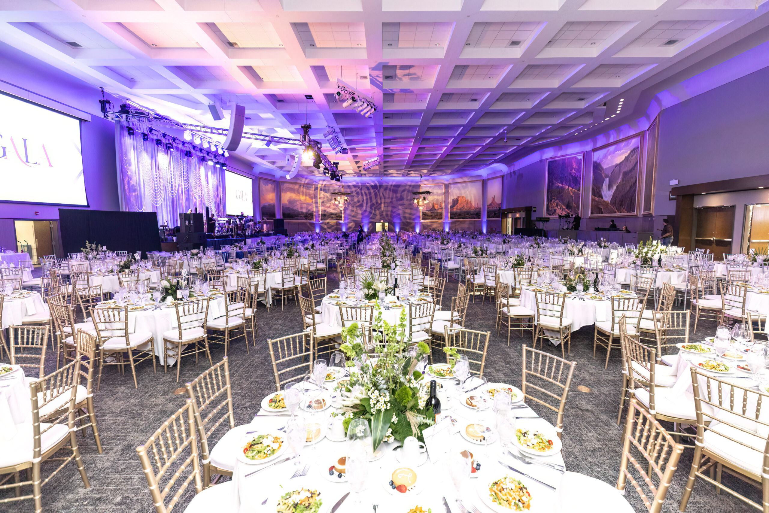 tables set with decorative place settings for the 19th Annual President's Scholarship Gala