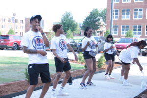 student ambassadors line dance during Lion Camp
