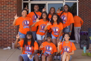 Student Ambassadors show L's Up during Lion Camp