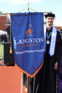 Jake Landes in doctoral regalia