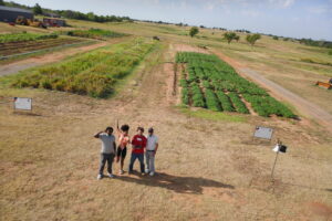 group photo of Braylon Hood Colbert and his friends taken from the drone he is piloting